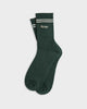 Flat lay product photo of The Mercer Tennis Socks in green.