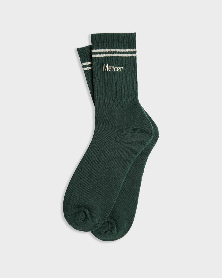 Flat lay product photo of The Mercer Tennis Socks in green.