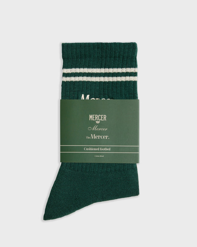 Flat lay product photo of The Mercer Tennis Socks in green.