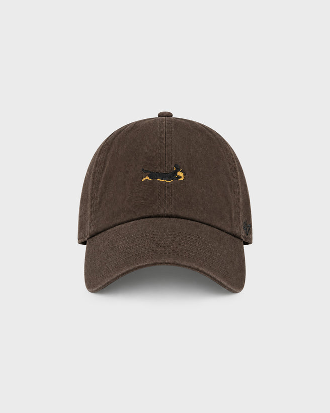 Brown 47 Base Runner Clean Up Cap in a relaxed fit with an embroidered dachshund on the front and an adjustable closure.