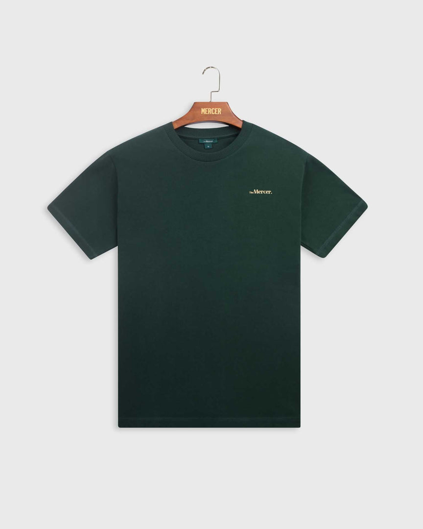 the mercer brand t shirt with small logo green