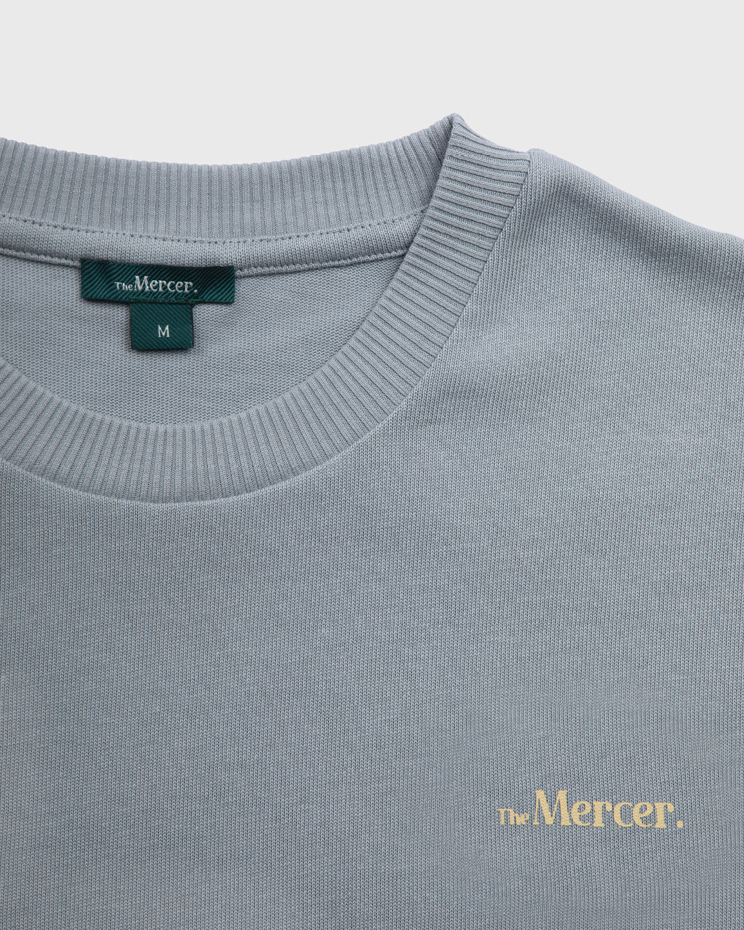 the mercer brand heavy tee shirt blue with small logo 