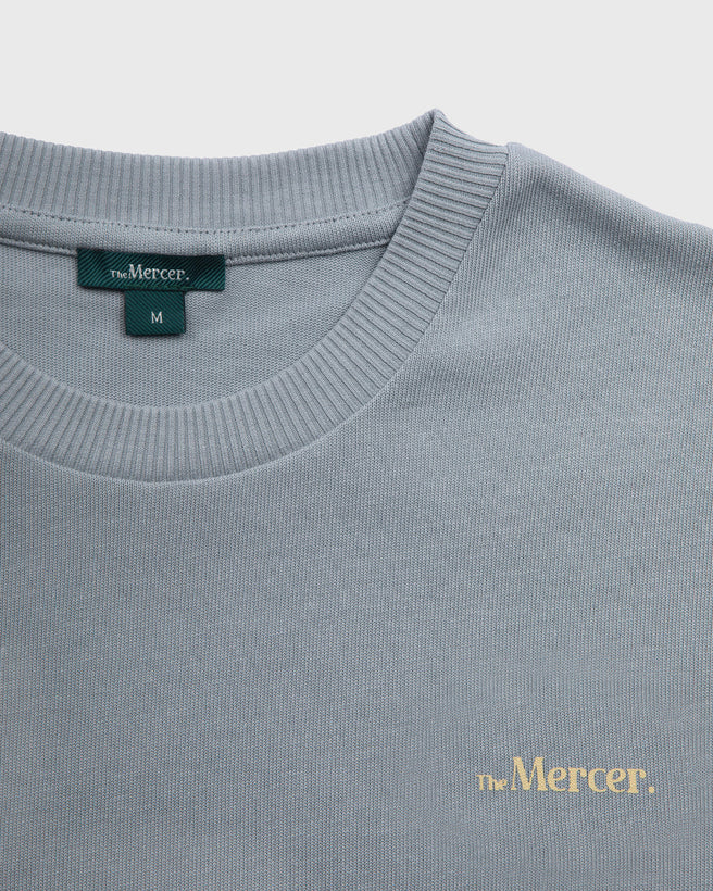 the mercer brand heavy tee shirt blue with small logo 
