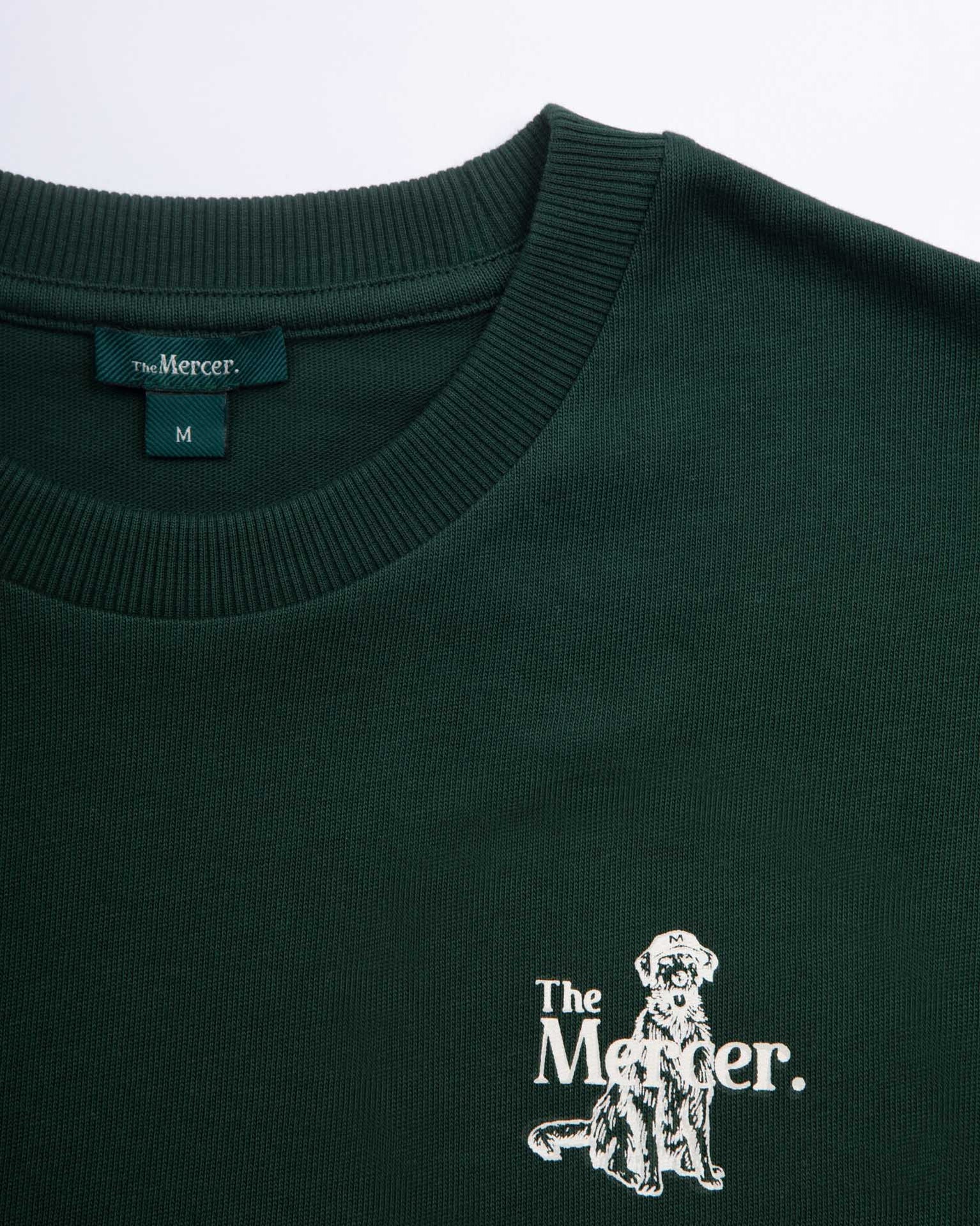 close up of the mercer t-shirt with dog