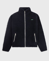 The mercer brand wool zip navy with white zippers and green logo front