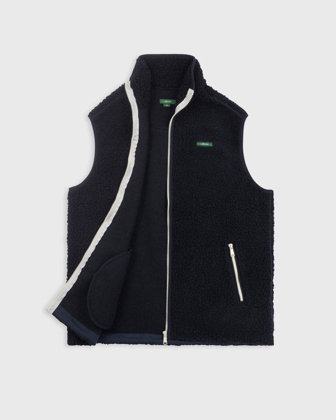 the mercer brand wool bodywarmer navy with green logo
