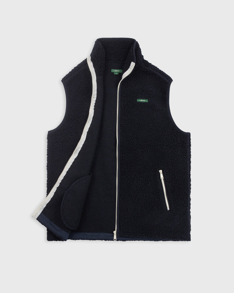 the mercer brand wool bodywarmer navy with green logo