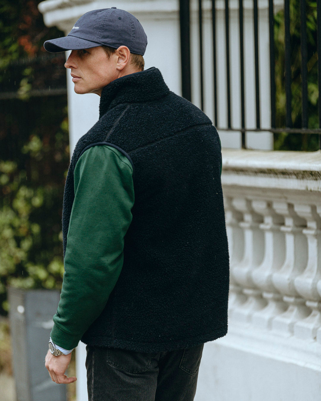 the mercer brand wool bodywarmer navy with green logo
