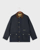 Front of the mercer brand navy subway jacket