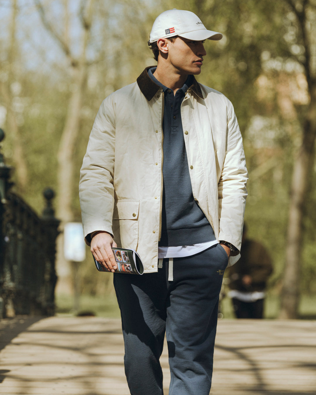 The Mercer Brand navy sweatpants with white drawstring on a light grey background