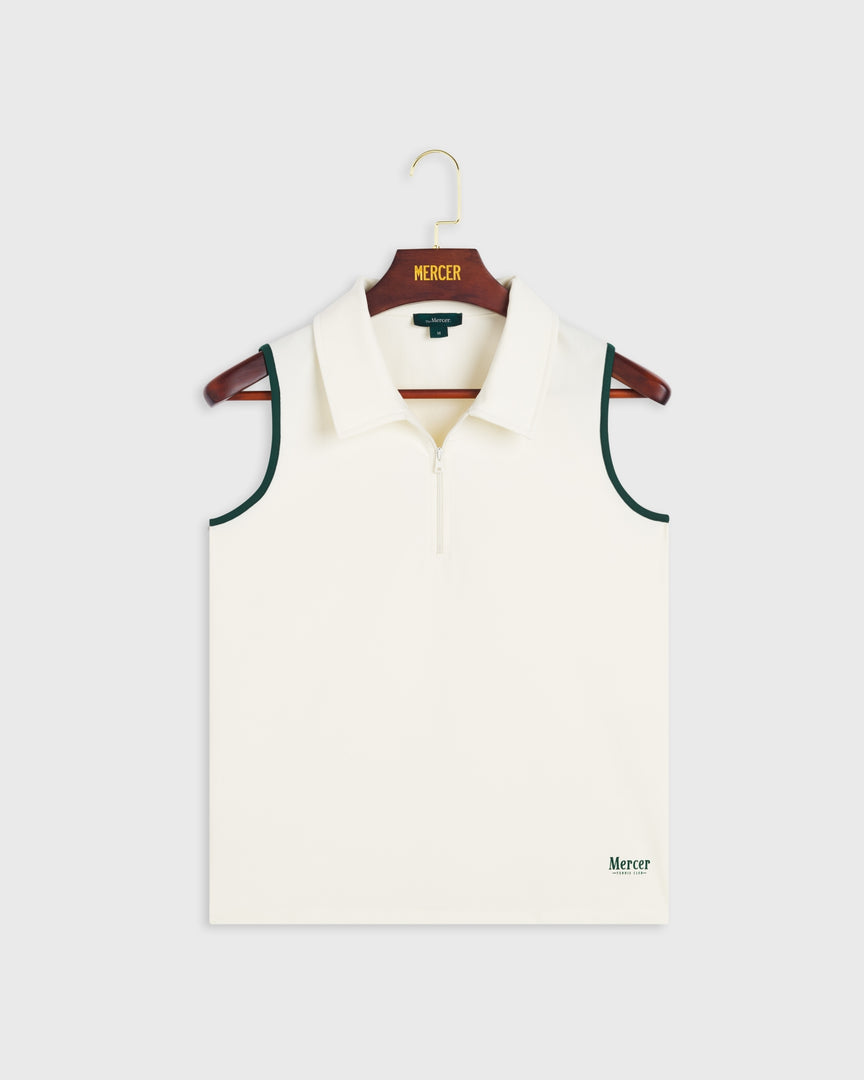 Product photo of the front of The Mercer Tennis polo in off white.