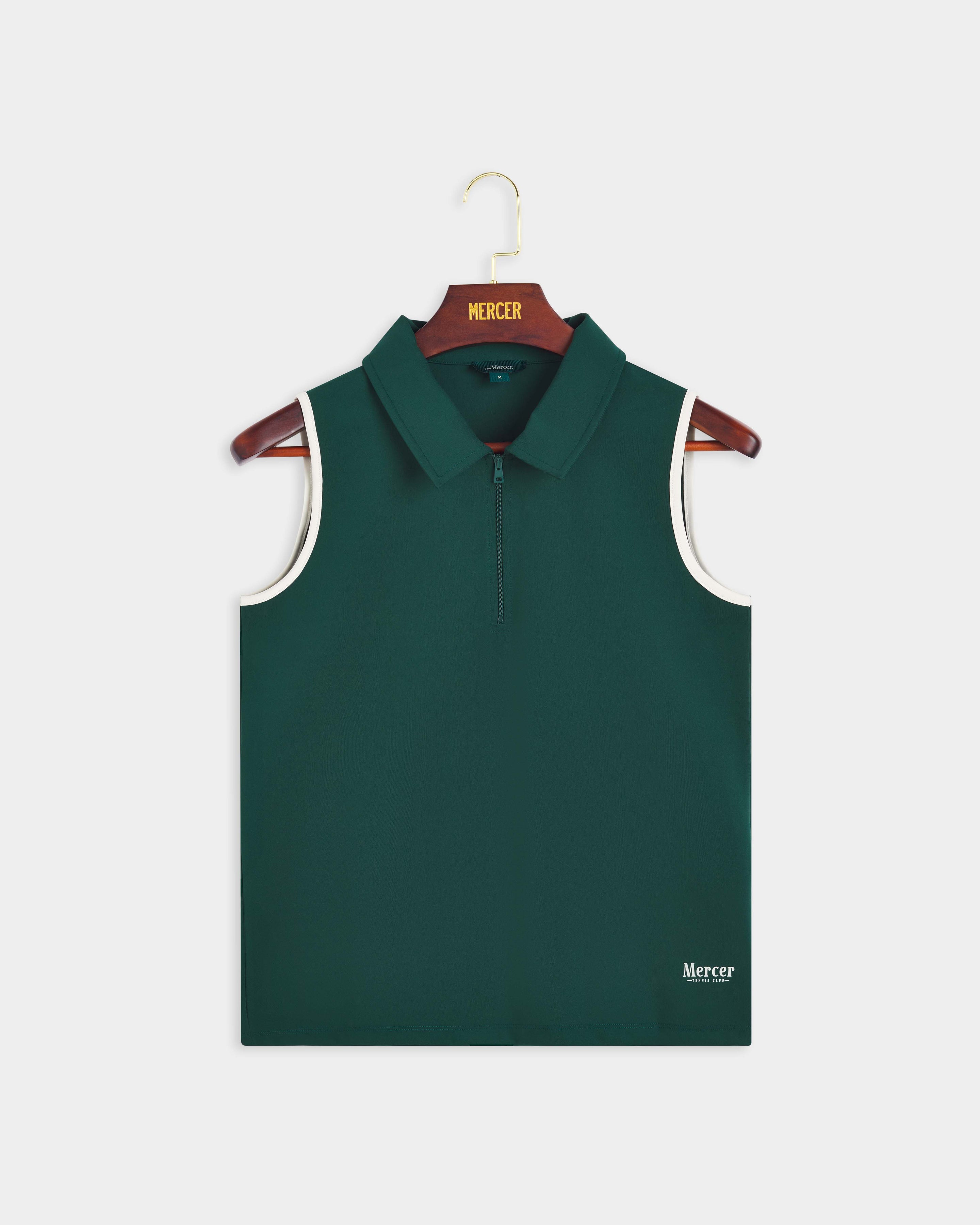 Product photo of the front of The Mercer Tennis Polo in green.