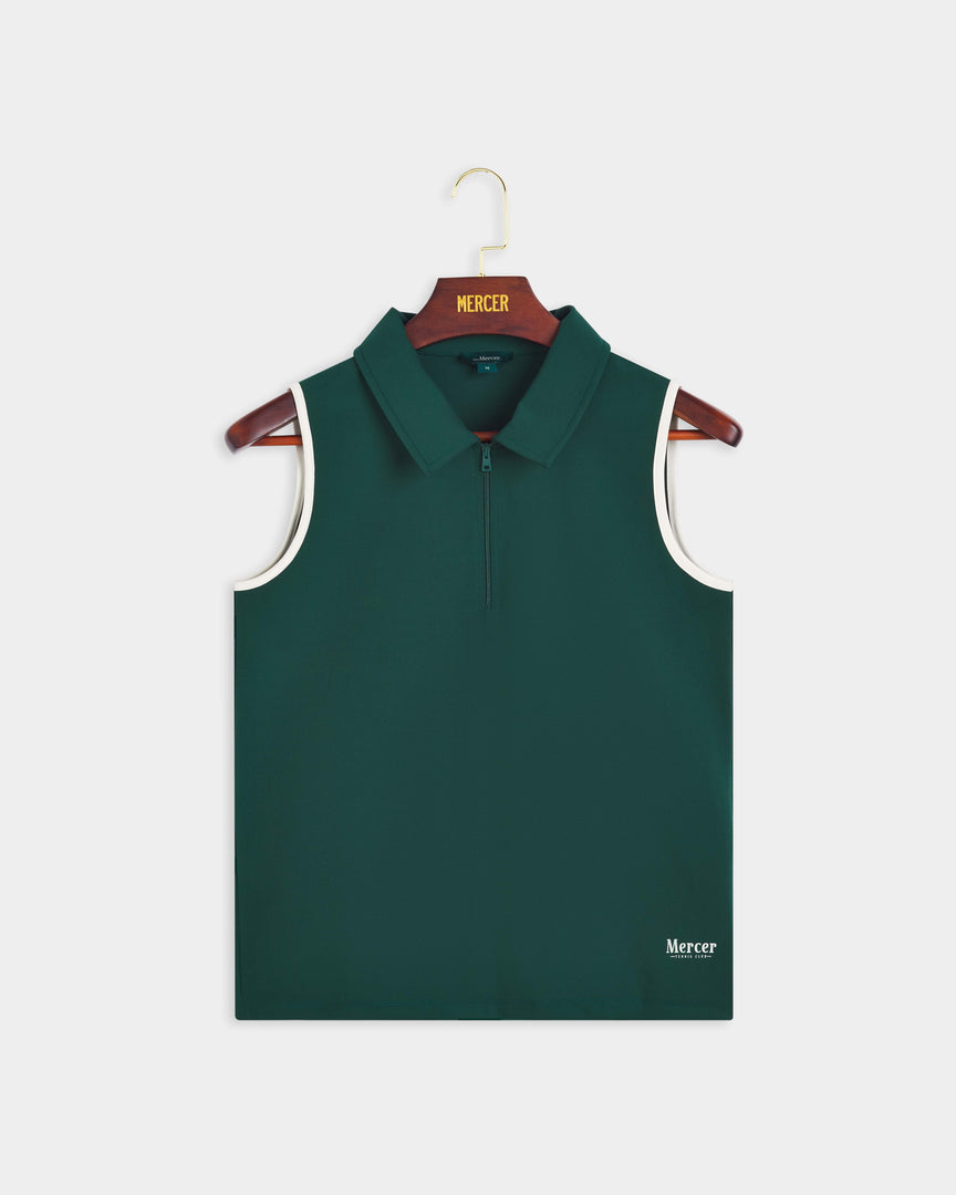 Product photo of the front of The Mercer Tennis Polo in green.