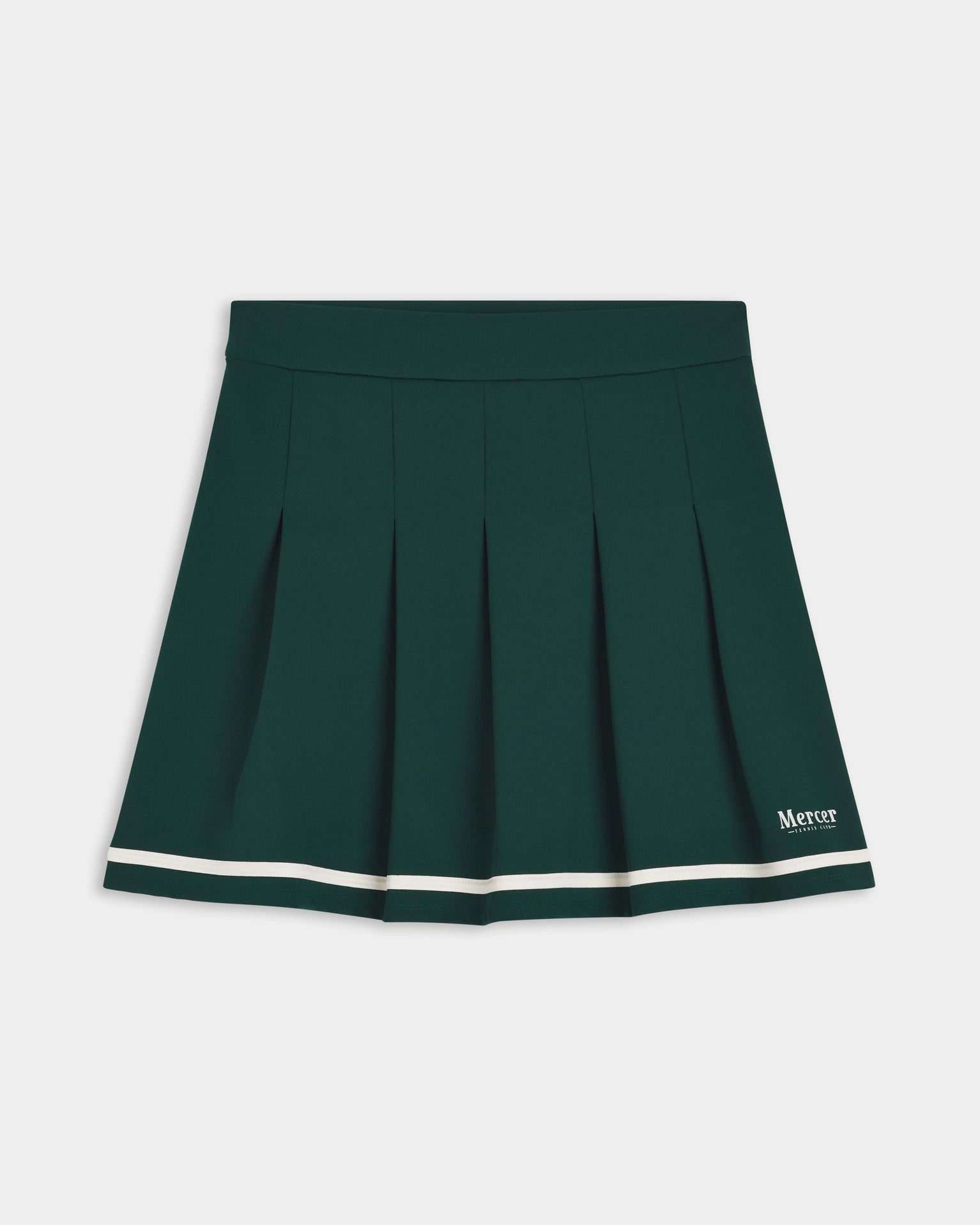 Flat lay of the front of The Mercer Tennis Skirt in green.