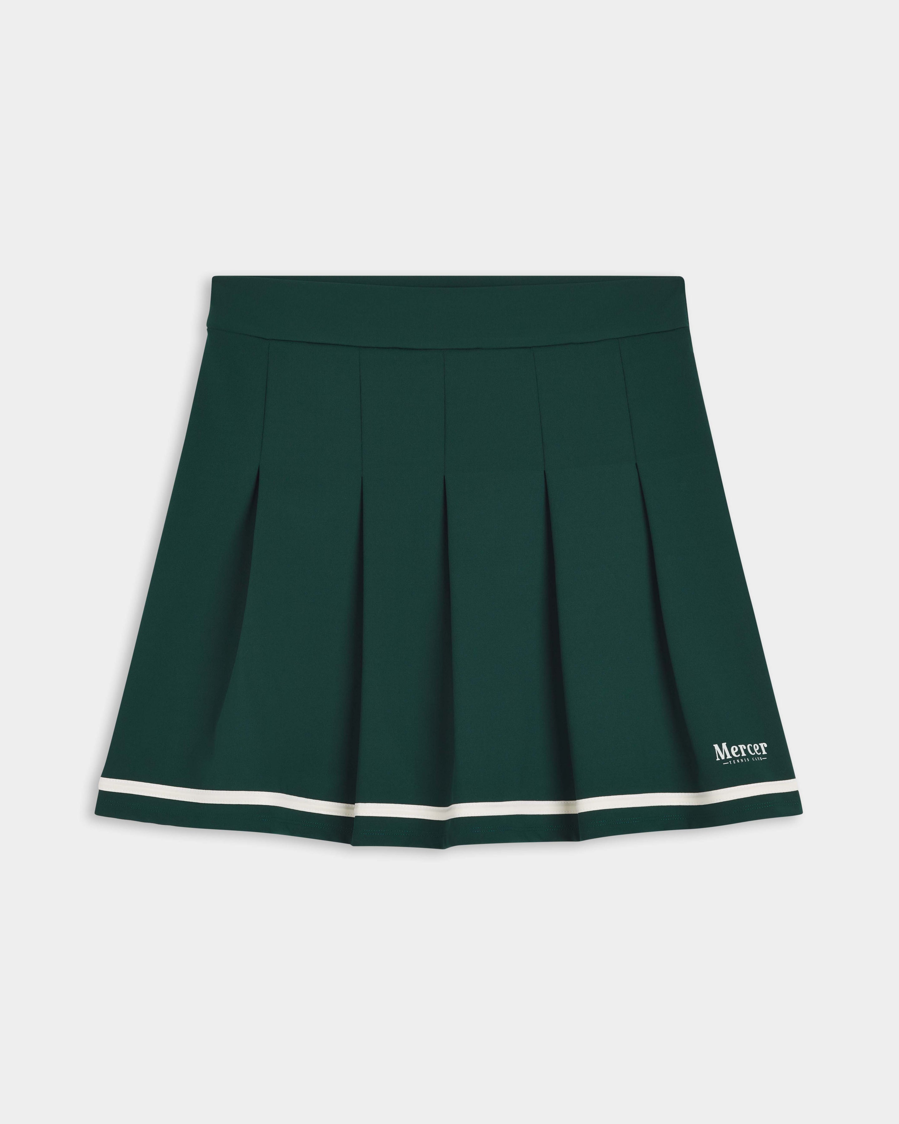 Flat lay of the front of The Mercer Tennis Skirt in green.