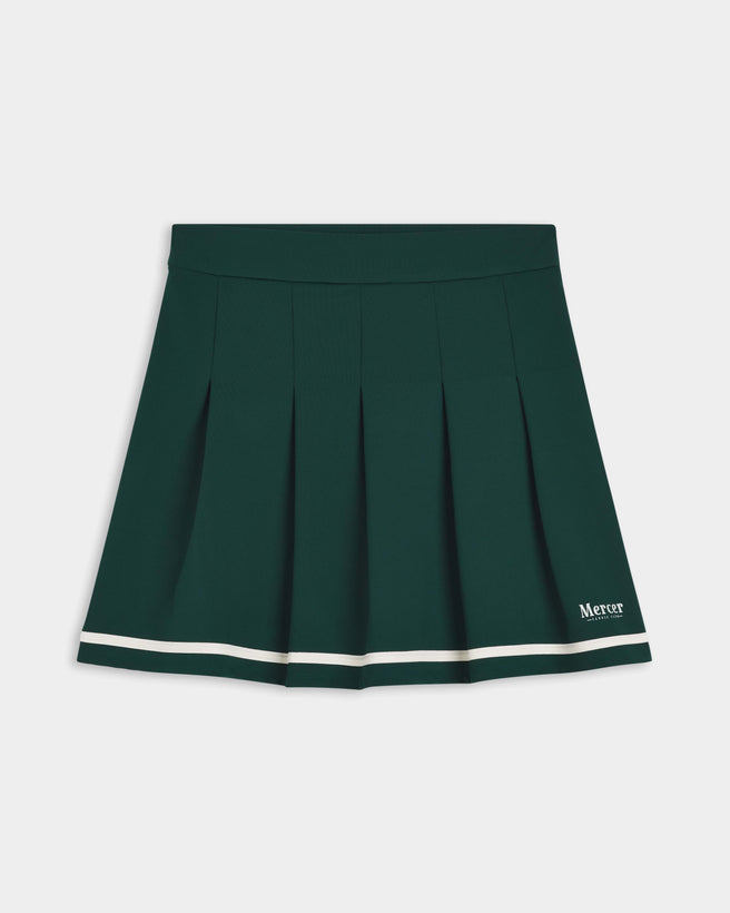 Flat lay of the front of The Mercer Tennis Skirt in green.