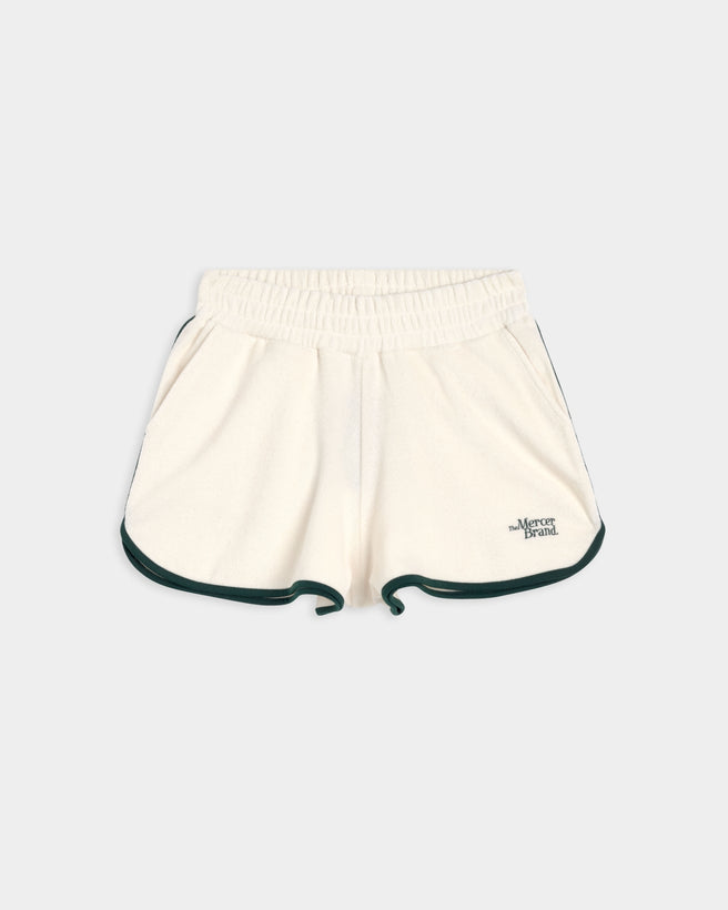 Flat lay of The Mercer Terry Short in off white.