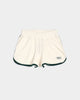 Flat lay of The Mercer Terry Short in off white.