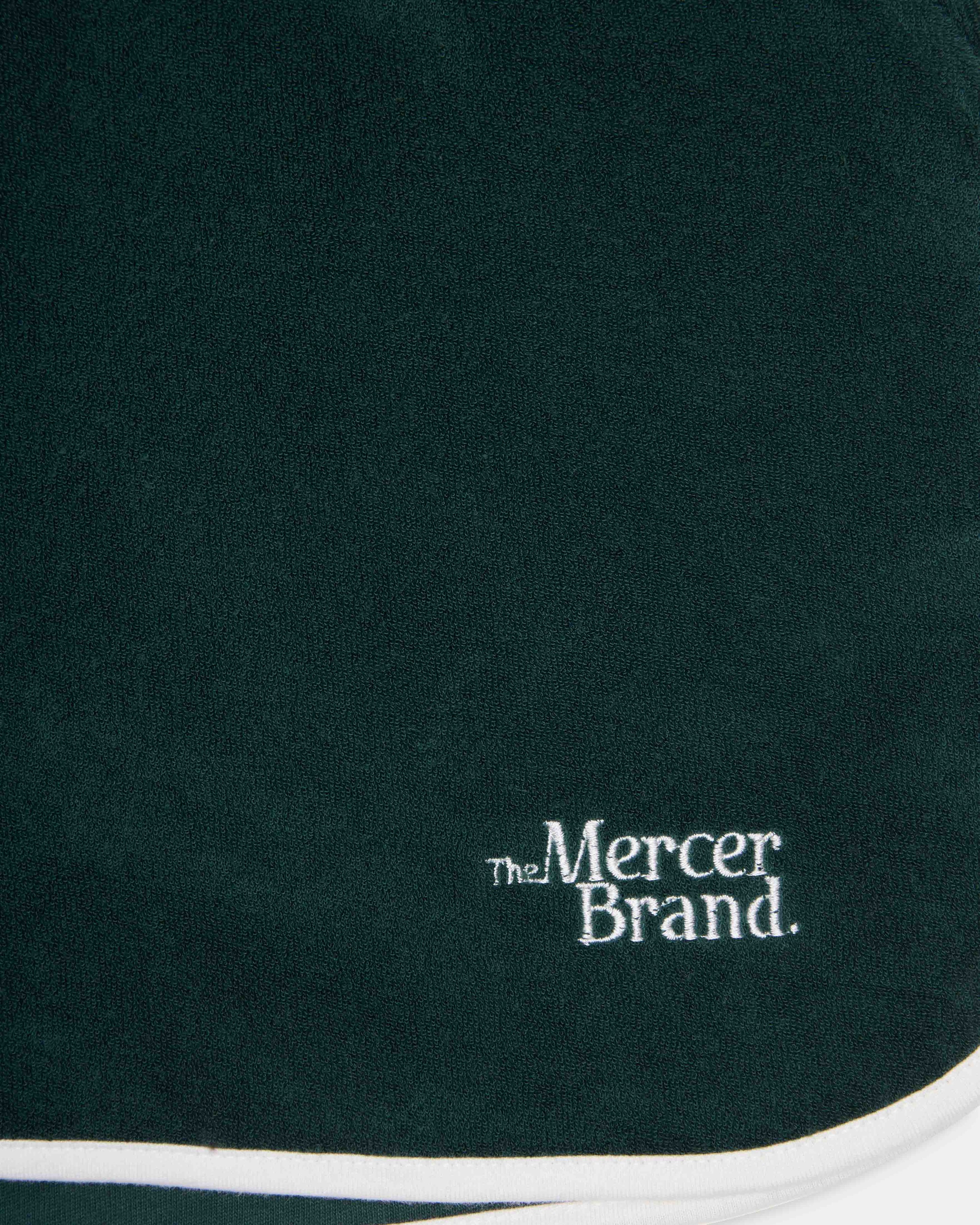 Flat lay of The Mercer Terry Short W in green.