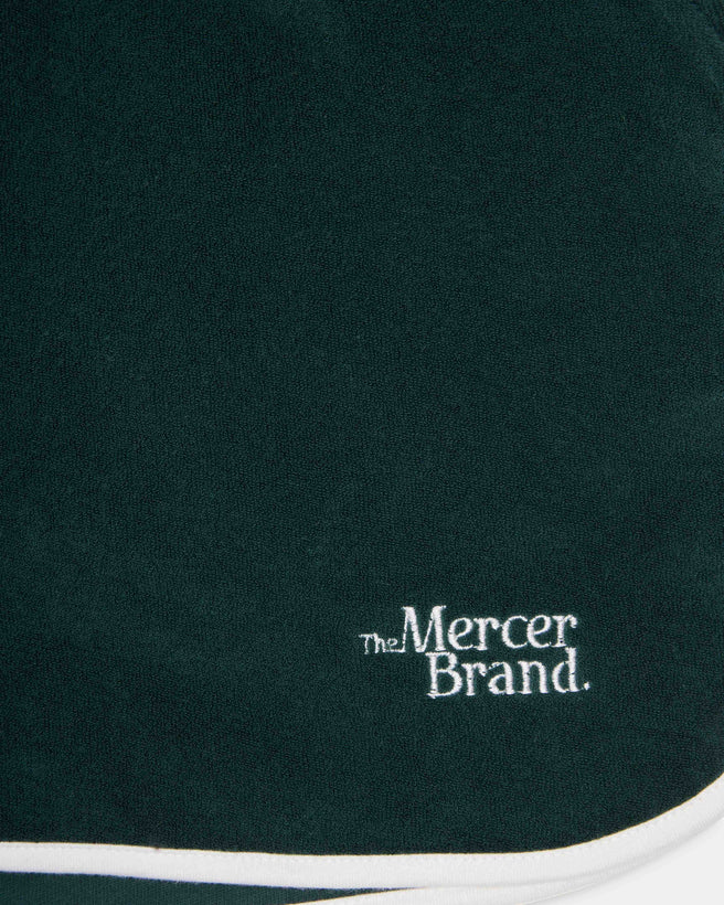 Flat lay of The Mercer Terry Short W in green.