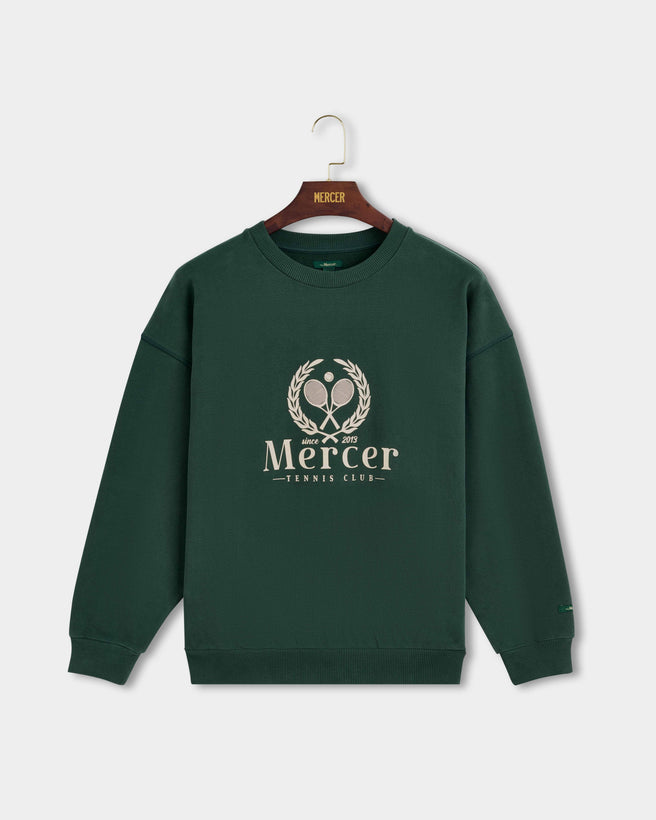 Product photo of the front of The Mercer Tennis Sweat in green.