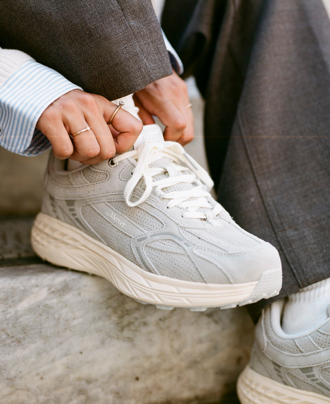 the mercer brand sneaker the re-run max grey with off white sole and perforated leather 