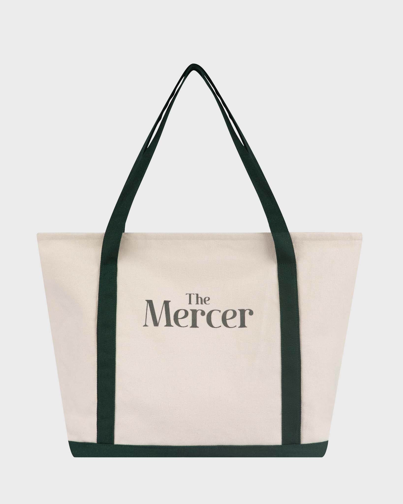 the mercer brand canvas bag green details and with logo and dog with Porsche car